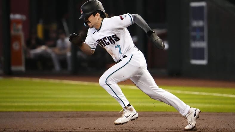 Arizona Diamondbacks Corbin Carroll (7) steals second base which is his 49th stolen base of his rookie season against the San Francisco Giants in the first inning at Chase Field in Phoenix on Sept. 20, 2023.