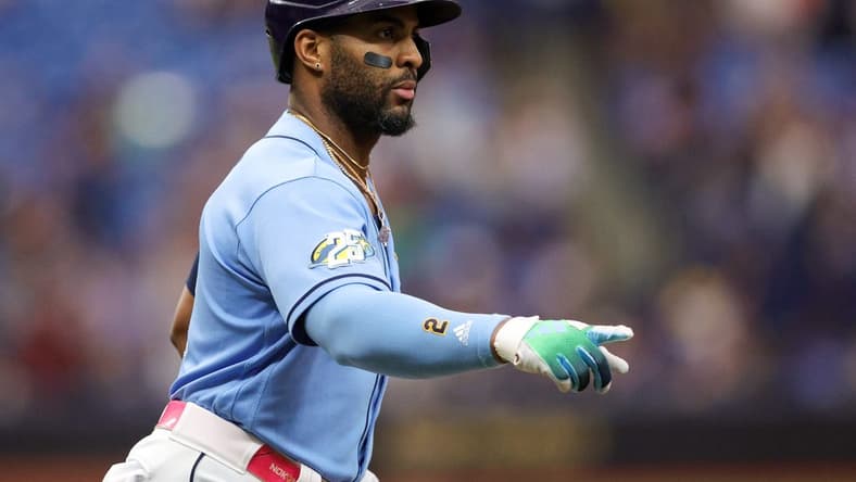 Sep 23, 2023; St. Petersburg, Florida, USA; Tampa Bay Rays first baseman Yandy Diaz (2) celebrates after hitting a solo home run against the Toronto Blue Jays in the first inning at Tropicana Field. Mandatory Credit: Nathan Ray Seebeck-USA TODAY Sports