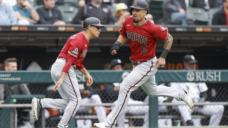 Sep 27, 2023; Chicago, Illinois, USA; Arizona Diamondbacks third baseman Jace Peterson (6) runs to score against the Chicago White Sox during the third inning at Guaranteed Rate Field. Mandatory Credit: Kamil Krzaczynski-USA TODAY Sports