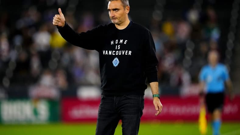 Sep 27, 2023; Commerce City, Colorado, USA; Vancouver Whitecaps FC head coach Vanni Sartini reacts in the first half against the Colorado Rapids at Dick's Sporting Goods Park. Mandatory Credit: Ron Chenoy-USA TODAY Sports