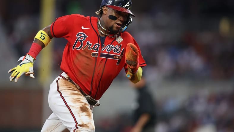 Sep 29, 2023; Atlanta, Georgia, USA; Atlanta Braves right fielder Ronald Acuna Jr. (13) rounds third against the Washington Nationals in the first inning at Truist Park. Mandatory Credit: Brett Davis-USA TODAY Sports