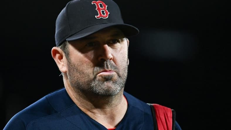 Sep 30, 2023; Baltimore, Maryland, USA; Boston Red Sox game planning coordinator/catching coach Jason Varitek (33) walks on the field before the game against the Baltimore Orioles at Oriole Park at Camden Yards. Mandatory Credit: Tommy Gilligan-USA TODAY Sports