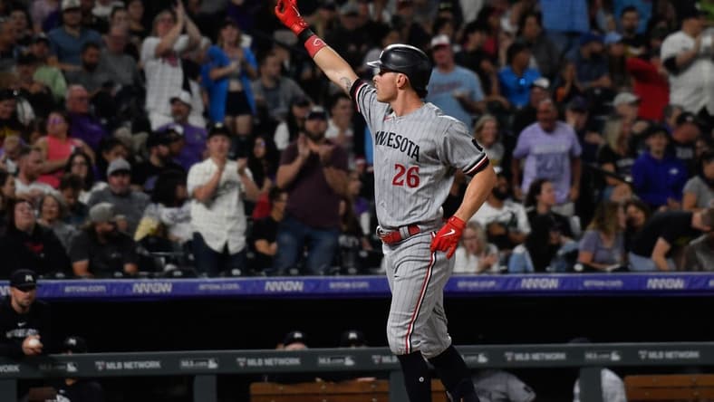 Sep 30, 2023; Denver, Colorado, USA; Minnesota Twins right fielder Max Kepler (26) points to the stands after his three run home run in the sixth inning against the Colorado Rockies at Coors Field. Mandatory Credit: John Leyba-USA TODAY Sports