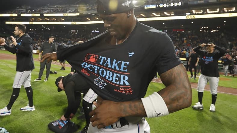 Sep 30, 2023; Pittsburgh, Pennsylvania, USA; Miami Marlins center fielder Jazz Chisholm Jr. (2) celebrates on the field after the Marlins defeated the Pittsburgh Pirates at PNC Park to secure a berth in the 2023 MLB playoffs. Miami won 7-4. Mandatory Credit: Charles LeClaire-USA TODAY Sports