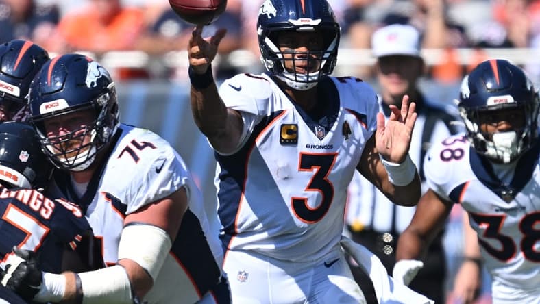 Oct 1, 2023; Chicago, Illinois, USA; Denver Broncos quarterback Russell Wilson (3) passes in the second quarter against the Chicago Bears at Soldier Field. Mandatory Credit: Jamie Sabau-USA TODAY Sports