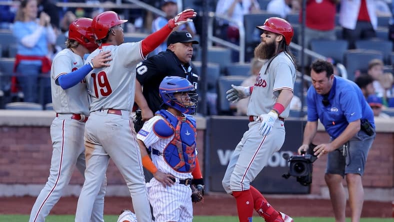 Oct 1, 2023; New York City, New York, USA; Philadelphia Phillies left fielder Brandon Marsh (16) celebrates his three run home run against the New York Mets with left fielder Cristian Pache (19) and second baseman Bryson Stott (5) during the ninth inning at Citi Field. Mandatory Credit: Brad Penner-USA TODAY Sports