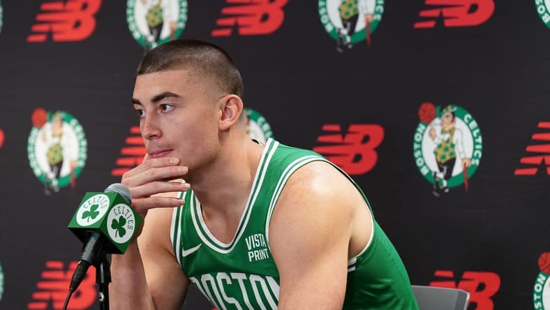Oct 2, 2023; Boston, Celtics, USA; Boston Celtics guard Payton Pritchard (11) talks with sports media during Boston Celtics Media Day. Mandatory Credit: David Butler II-USA TODAY Sports