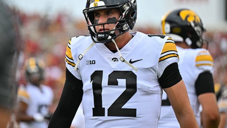 Sep 9, 2023; Ames, Iowa, USA; Iowa Hawkeyes quarterback Cade McNamara (12) looks on before the game against the Iowa State Cyclones at Jack Trice Stadium. Mandatory Credit: Jeffrey Becker-USA TODAY Sports