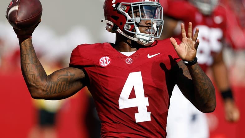 Sep 23, 2023; Tuscaloosa, Alabama, USA;  Alabama Crimson Tide quarterback Jalen Milroe (4) throws a pass against the Mississippi Rebels during the first half at Bryant-Denny Stadium. Mandatory Credit: Butch Dill-USA TODAY Sports