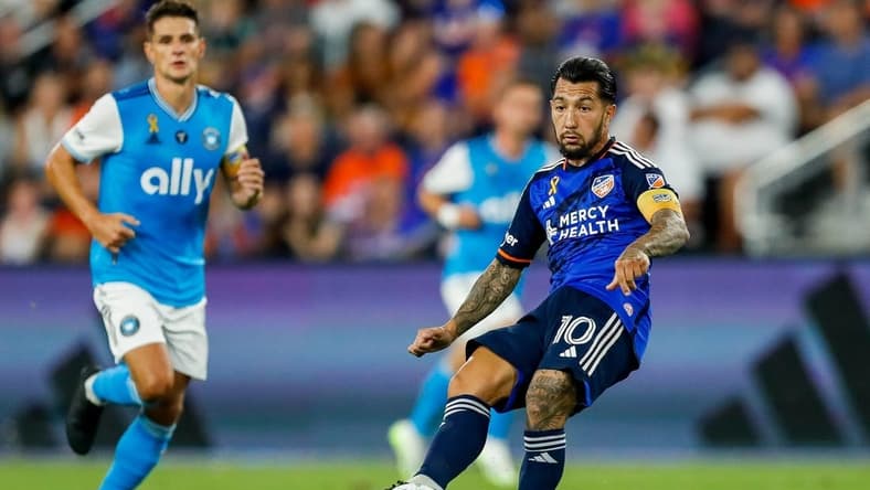 Sep 23, 2023; Cincinnati, Ohio, USA; FC Cincinnati midfielder Luciano Acosta (10) dribbles against Charlotte FC in the first half at TQL Stadium. Mandatory Credit: Katie Stratman-USA TODAY Sports