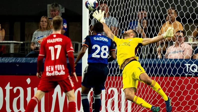 New York Red Bulls forward Elias Manoel (11) ball gets passed FC Cincinnati goalkeeper Alec Kann (1) for a goal in the first half of the MLS match between FC Cincinnati and New York Red Bulls at TQL Stadium in Cincinnati on Wednesday, Oct. 4, 2023.