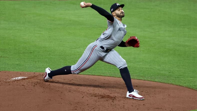 Oct 8, 2023; Houston, Texas, USA; Minnesota Twins starting pitcher Pablo Lopez (49) throws a pitch against the Houston Astros in the first inning for game two of the ALDS for the 2023 MLB playoffs at Minute Maid Park. Mandatory Credit: Thomas Shea-USA TODAY Sports