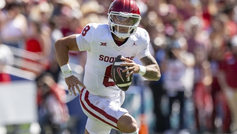 Oct 7, 2023; Dallas, Texas, USA; Oklahoma Sooners quarterback Dillon Gabriel (8) in action during the game between the Texas Longhorns and the Oklahoma Sooners at the Cotton Bowl. Mandatory Credit: Jerome Miron-USA TODAY Sports