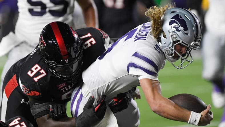 Kansas State's quarterback Avery Johnson (5) scores a touchdown against Texas Tech in a Big 12 conference football game, Saturday, Oct. 14, 2023, at Jones AT&T Stadium.