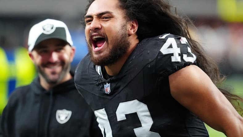 Oct 15, 2023; Paradise, Nevada, USA; Las Vegas Raiders linebacker Kana'i Mauga (43) celebrates after the Raiders defeated the New England Patriots 21-17 at Allegiant Stadium. Mandatory Credit: Stephen R. Sylvanie-USA TODAY Sports