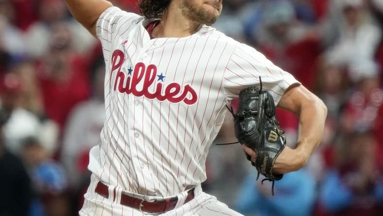 Philadelphia Phillies starting pitcher Aaron Nola (27) throws to the Arizona Diamondbacks in the sixth inning during Game 2 of the NLCS at Citizens Bank Park in Philadelphia on Oct. 17, 2023.