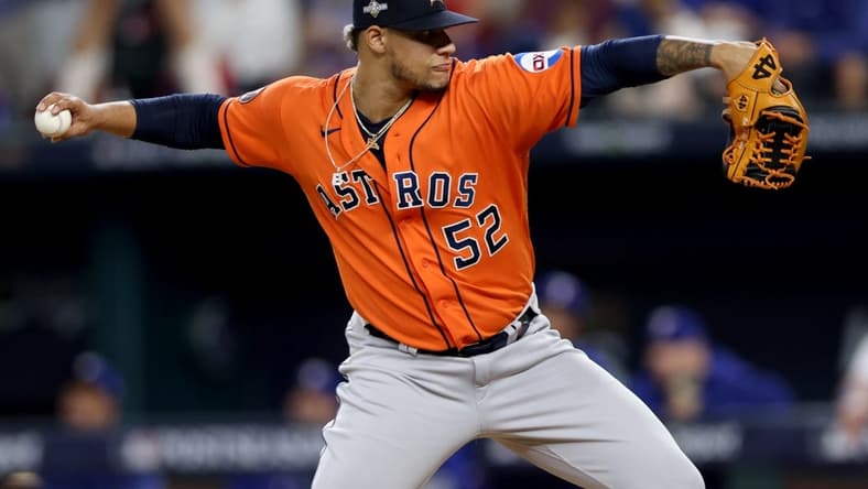 Oct 20, 2023; Arlington, Texas, USA; Houston Astros pitcher Bryan Abreu (52) throws during the eighth inning of game five in the ALCS against the Texas Rangers for the 2023 MLB playoffs at Globe Life Field. Mandatory Credit: Andrew Dieb-USA TODAY Sports