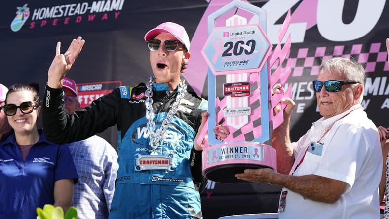 Oct 21, 2023; Homestead, Florida, USA; NASCAR Craftsman Truck Series driver Carson Hocevar (42) celebrates after winning the Baptist Health Cancer Care 200 at Homestead-Miami Speedway. Mandatory Credit: Jasen Vinlove-USA TODAY Sports