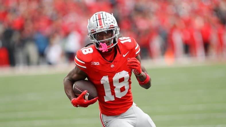 Oct 21, 2023; Columbus, Ohio, USA;  Ohio State Buckeyes wide receiver Marvin Harrison Jr. (18) scores a touchdown against the Penn State Nittany Lions during the fourth quarter at Ohio Stadium. Mandatory Credit: Joseph Maiorana-USA TODAY Sports