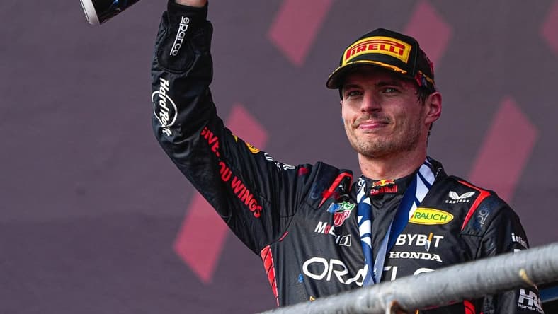Oracle Red Bull Racing driver Max Verstappen hoists the trophy after winning the Formula 1 Lenovo United States Grand Prix at Circuit of Americas on Sunday Oct. 22, 2023.