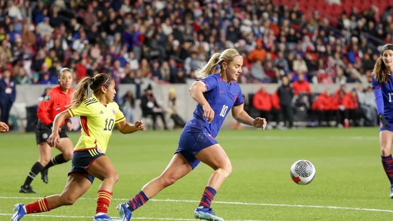 Oct 26, 2023; Sandy, Utah, USA;  United States midfielder Lindsey Horan (10) keeps the ball away from Colombia midfielder Leicy Santos (10) during the first half at America First Field. Mandatory Credit: Chris Nicoll-USA TODAY Sports