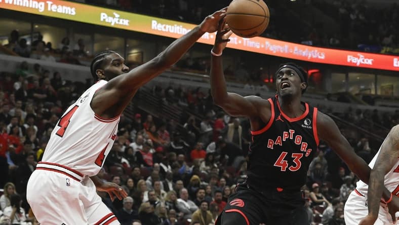 Oct 27, 2023; Chicago, Illinois, USA; Chicago Bulls forward Patrick Williams (44) plays for the ball against Toronto Raptors forward Pascal Siakam (43) during the first half at the United Center. Mandatory Credit: Matt Marton-USA TODAY Sports