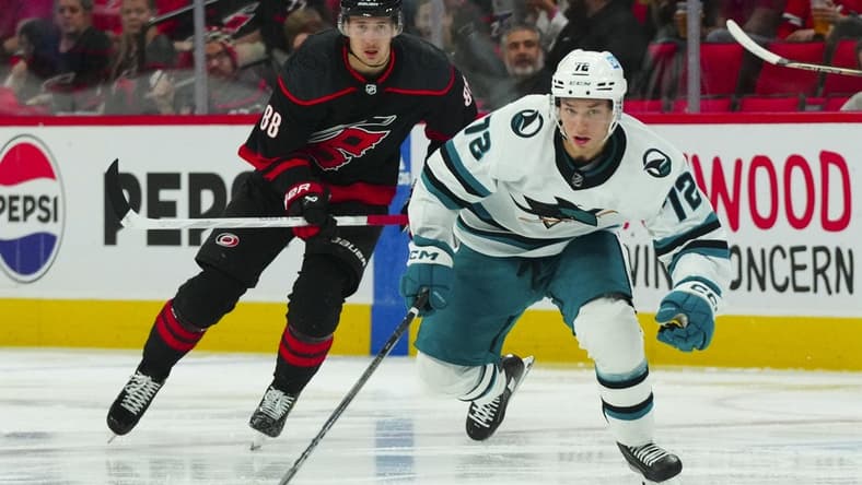 Oct 27, 2023; Raleigh, North Carolina, USA; San Jose Sharks center William Eklund (72) skates with the puck against the Carolina Hurricanes during the second period at PNC Arena. Mandatory Credit: James Guillory-USA TODAY Sports
