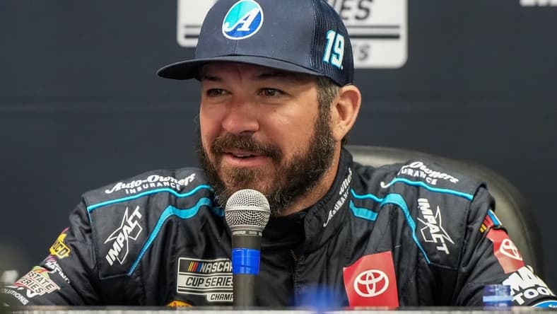 Oct 28, 2023; Martinsville, Virginia, USA; NASCAR Cup Series driver Martin Truex Jr. (19) addresses the media at Martinsville Speedway. Mandatory Credit: David Yeazell-USA TODAY Sports