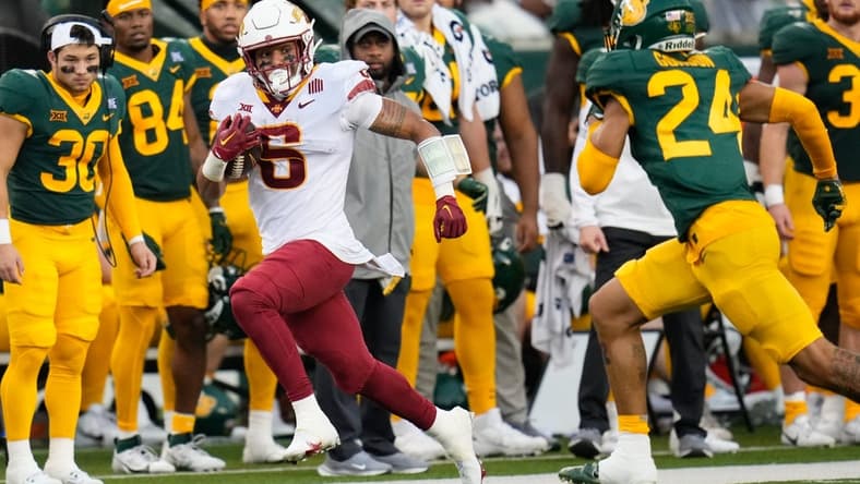 Oct 28, 2023; Waco, Texas, USA;  Iowa State Cyclones running back Eli Sanders (6) runs the ball as Baylor Bears safety Corey Gordon Jr. (24) gives chase during the first half at McLane Stadium. Mandatory Credit: Chris Jones-USA TODAY Sports