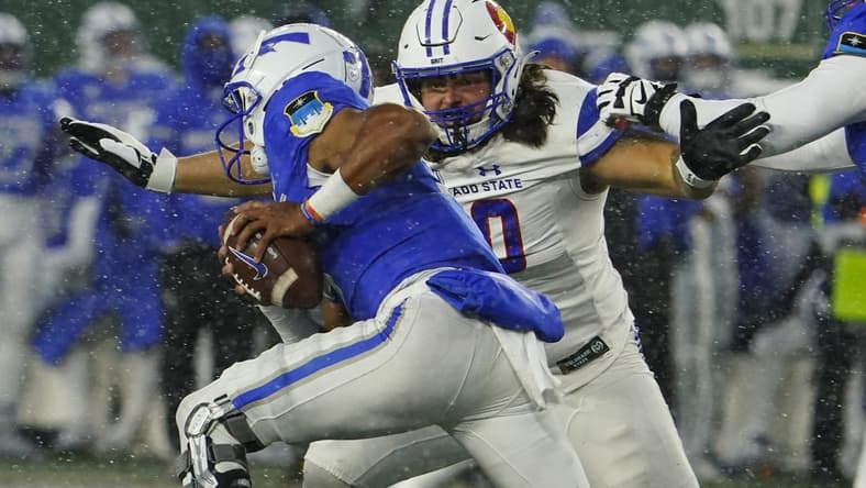 Oct 28, 2023; Fort Collins, Colorado, USA;  Colorado State Rams defensive lineman Grady Kelly (90) chases Air Force Falcons quarterback Zac Larrier (9) in the second quarter at Sonny Lubick Field at Canvas Stadium. Mandatory Credit: Michael Madrid-USA TODAY Sports
