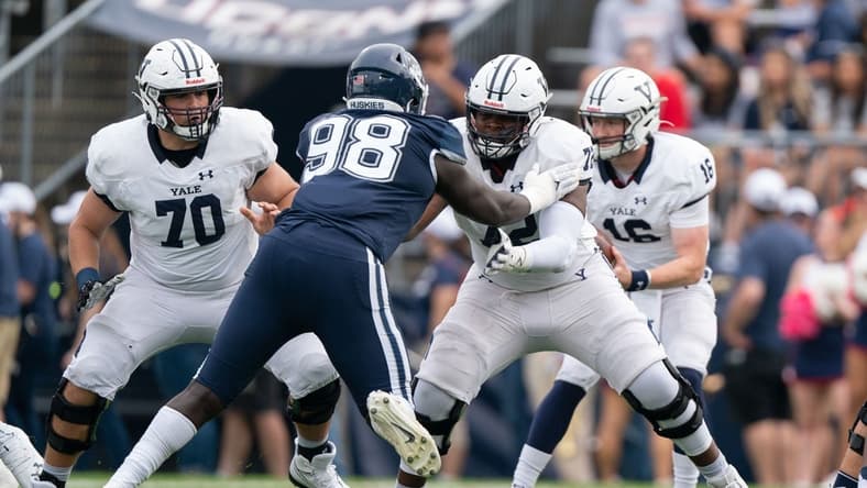 (File photo) Yale Bulldogs offensive lineman Kiran Amegadjie (72) blocks Connecticut Huskies defensive lineman Lwal Uguak (98) during the first half at Rentschler Field at Pratt & Whitney Stadium. Mandatory Credit: Gregory Fisher-USA TODAY Sports