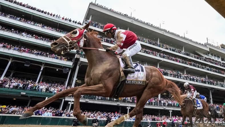 Rich Strike, with Sonny Leon up, runs down the field to win the 148th running of the Kentucky Derby on Saturday, May 7, 2022
Derbymsc18