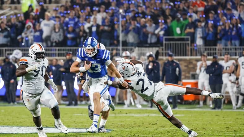 Duke Blue Devils quarterback Riley Leonard had three total TDs to beat the Virginia Cavaliers last season, but his status for Saturday's game is up in the air. Mandatory Credit: Jaylynn Nash-USA TODAY Sports