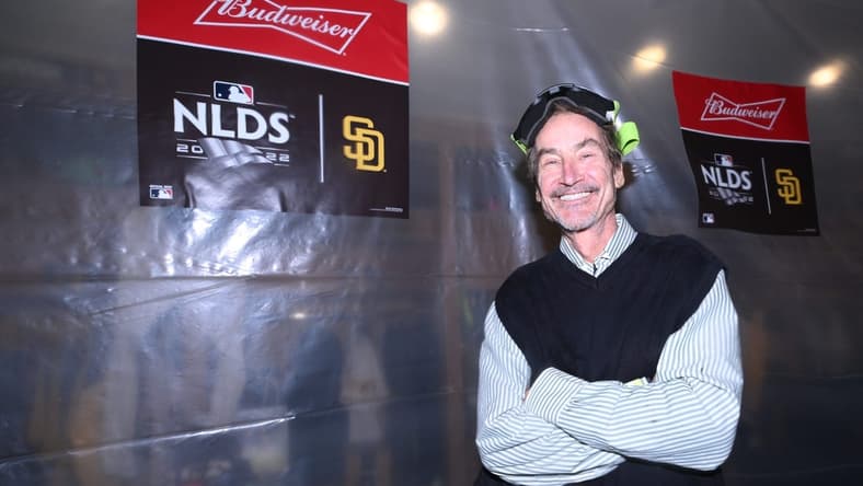 Oct 15, 2022; San Diego, California, USA; San Diego Padres owner Peter Seidler celebrates defeating the Los Angeles Dodgers during game four of the NLDS for the 2022 MLB Playoffs at Petco Park. Mandatory Credit: Orlando Ramirez-USA TODAY Sports