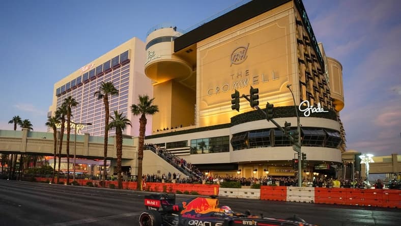 Nov 5, 2022; Las Vegas, Nevada, USA;  Oracle Red Bull Racing driver Sergio Perez drives on the track during the Formula One Las Vegas Grand Prix Launch Party at Las Vegas Strip. Mandatory Credit: Ray Acevedo-USA TODAY Sports