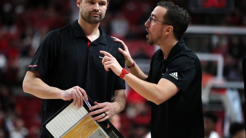 Dec 13, 2022; Lubbock, Texas, USA;  Eastern Washington Eagles coach David Riley and assistant coach Pedro Garcia Rosado in the second half during the game against the Texas Tech Red Raiders at United Supermarkets Arena. Mandatory Credit: Michael C. Johnson-USA TODAY Sports