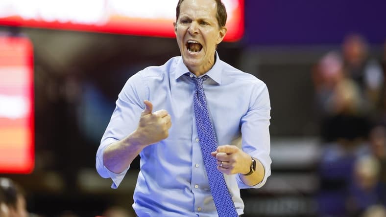 Jan 26, 2023; Seattle, Washington, USA; Washington Huskies head coach Mike Hopkins speaks to players on the bench during the second half against the Arizona State Sun Devils at Alaska Airlines Arena at Hec Edmundson Pavilion. Mandatory Credit: Joe Nicholson-USA TODAY Sports