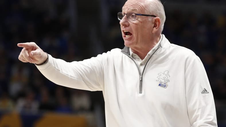 Jan 28, 2023; Pittsburgh, Pennsylvania, USA; Miami (Fl) Hurricanes head coach Jim Larra aga reacts on the sidelines against the Pittsburgh Panthers during the first half at the Petersen Events Center. Mandatory Credit: Charles LeClaire-USA TODAY Sports