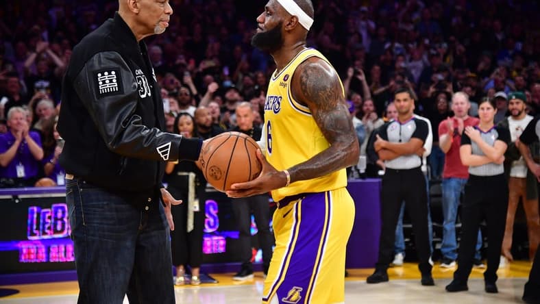 Feb 7, 2023; Los Angeles, California, USA; Los Angeles Lakers forward LeBron James (6) shakes hands with former player Kareem Abdul-Jabbar after breaking the NBA all time scoring record against the Oklahoma City Thunder during the second half at Crypto.com Arena. Mandatory Credit: Gary A. Vasquez-USA TODAY Sports