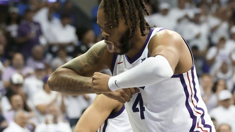 Feb 20, 2023; Fort Worth, Texas, USA;  TCU Horned Frogs center Eddie Lampkin Jr. (4) reacts during the second half against the Kansas Jayhawks at Ed and Rae Schollmaier Arena. Mandatory Credit: Kevin Jairaj-USA TODAY Sports