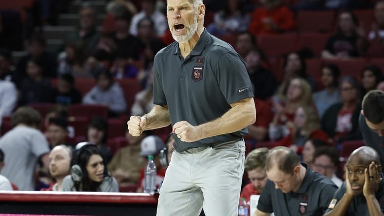 Feb 21, 2023; Norman, Oklahoma, USA; Oklahoma Sooners head coach Porter Moser reacts after a play against the Texas Tech Red Raiders during the first half at Lloyd Noble Center. Mandatory Credit: Alonzo Adams-USA TODAY Sports