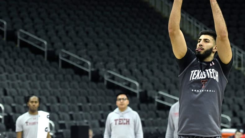 Texas Tech's forward Fardaws Aimaq (11) shoots the ball during practice ahead of the Big 12 basketball tournament, Tuesday, March 7, 2023, at T-Mobile Center in Kansas City.