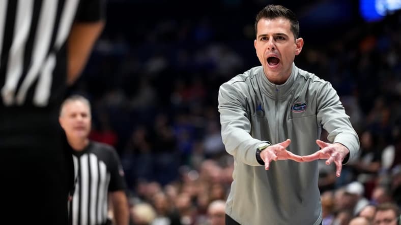 Florida head coach Todd Golden disputes a call during the first half of a second round SEC Men's Basketball Tournament game against Mississippi State at Bridgestone Arena in Nashville, Tenn., Thursday, March 9, 2023.

Syndication The Tennessean