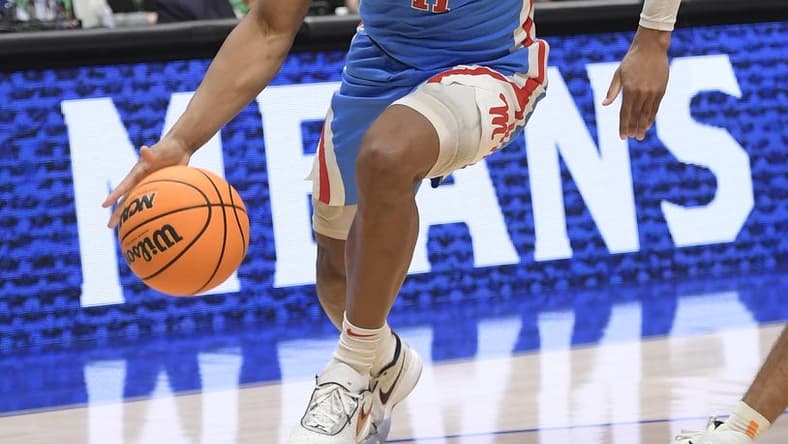Mar 9, 2023; Nashville, TN, USA;  Mississippi Rebels guard Matthew Murrell (11) dribbles baseline against the Tennessee Volunteers during the first half at Bridgestone Arena. Mandatory Credit: Steve Roberts-USA TODAY Sports