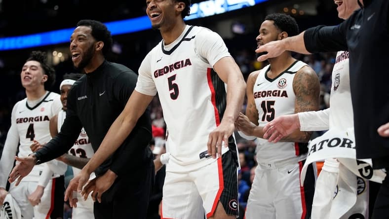 The Georgia bench celebrates a three point basket by Georgia guard Jabri Abdur-Rahim against LSU during the second half of a first round SEC Men   s Basketball Tournament game at Bridgestone Arena Wednesday, March 8, 2023, in Nashville, Tenn.

Sec Basketball Lsu Vs Georgia