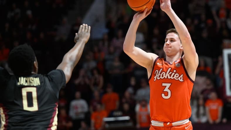 Mar 4, 2023; Blacksburg, Virginia, USA; Virginia Tech Hokies guard Sean Pedulla (3) shoots over Florida State Seminoles guard Chandler Jackson (0) at Cassell Coliseum. Mandatory Credit: Lee Luther Jr.-USA TODAY Sports