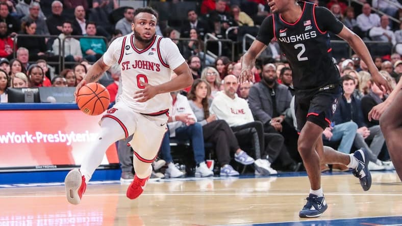 Feb 25, 2023; New York, New York, USA;  St. John's Red Storm guard Posh Alexander (0) and Connecticut Huskies guard Tristen Newton (2) at Madison Square Garden. Mandatory Credit: Wendell Cruz-USA TODAY Sports