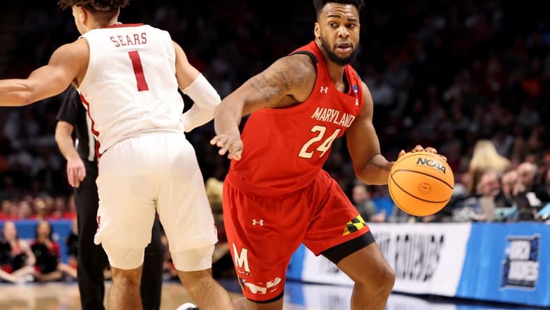 Mar 18, 2023; Birmingham, AL, USA; Maryland Terrapins forward Donta Scott (24) drives past Alabama Crimson Tide guard Mark Sears (1) during the first half at Legacy Arena. Mandatory Credit: Vasha Hunt-USA TODAY Sports