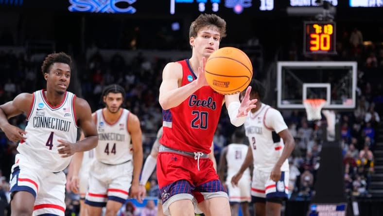 Mar 19, 2023; Albany, NY, USA; Saint Mary's Gaels guard Aidan Mahaney (20) receives a pass against the Connecticut Huskies during the first half at MVP Arena. Mandatory Credit: Gregory Fisher-USA TODAY Sports