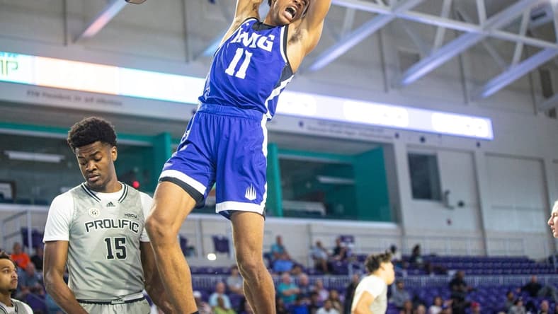 Khani Rooths of IMG Academy dunks  against Prolific Prep in GEICO High School Nationals quarterfinal game ay Suncoast Credit Union Arena on Thursday. IMG won.

Img Wins101